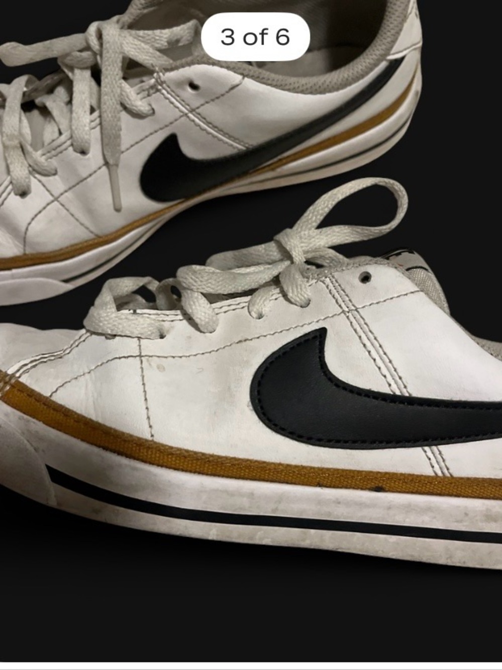 Nike White Leather Sneakers with Black Swoosh and Brown Accent